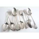 TABLE SPOONS:- A pair of George III bright-cut table spoons by either George Brasier or George