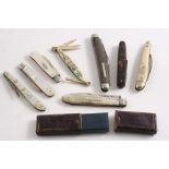 KNIVES:- A late Victorian folding fruit knife with mother of pearl sides (in a fluted case), two