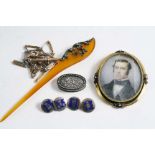 A VICTORIAN MINIATURE PORTRAIT OF A GENTLEMAN mounted as a brooch in gold and enamel frame; 6.5 x