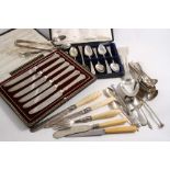 A MIXED LOT:- A cased set of six tea knives (plated blades), a case containing eight various