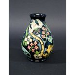 MOORCROFT VASE - GOLDEN LILY a boxed modern Moorcroft vase in the Golden Lily design, in the