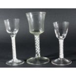 GEORGE III WINE GLASS, the ogee bowl on a stem with a multi-strand twist and double helix and