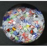 MILLEFIORI GLASS PAPERWEIGHT, probably 19th century and French, with scattered canes, diameter 7.