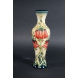 MOORCROFT VASE a boxed modern limited edition Moorcroft vase, with a floral design on a cream