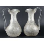 PAIR OF CRACKLE GLASS LEMONADE JUGS, late 19th century, of baluster form with clear glass handles,