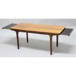 A H MCINTOSH EXTENDING COFFEE TABLE - 1960'S a teak coffee table with sliding extensions at either