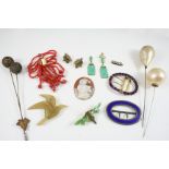 A QUANTITY OF JEWELLERY including a coral bracelet, an unframed carved shell cameo, a silver and