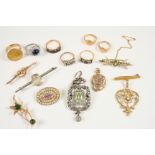 A QUANTITY OF JEWELLERY including a gold and half pearl set openwork foliate pendant, a peridot