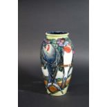 MOORCROFT VASE - SWALLOWS a boxed modern limited edition Moorcroft vase in the Swallows design.