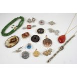 A QUANTITY OF JEWELLERY including a Victorian oval- shaped garnet brooch, a pair of jade stud