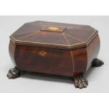 REGENCY ROSEWOOD AND TORTOISESHELL TEA CADDY, of octagonal form, the domed cover with central inlaid