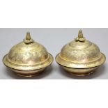 PAIR OF CONTINENTAL GILT METAL DISHES AND COVERS, possibly 18th century, the domed covers with