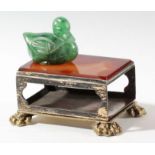RUSSIAN STYLE MATCHBOX HOLDER, the gilt metal box on lion paw feet surmounted by an agate panel