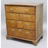 WALNUT AND ELM CHEST, early 18th century, the feather banded top above one long drawer, now fitted