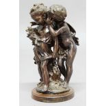 AFTER AUGUSTE MOREAU, Whispering Children, brown patinated bronze on a wooden plinth, signature to