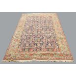 FERAGHAN RUG West Iran, the mid-indigo Herati field enclosed by pale mint green borders, 240cm x