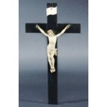 IVORY CRUCIFIX, 19th century, probably Dieppe, on an ebony cross, height 27cm