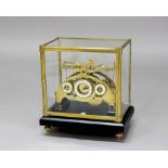 CONGREVE STYLE BRASS ROLLING BALL CLOCK, the three ivorine dials on brass, single fusee movement