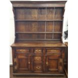 OAK DRESSER, 18th century, possibly Abglesey, the associated plate rack on a base