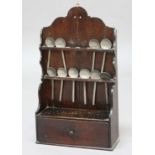 OAK SPOON RACK, probably 19th century, with a shaped back, two racks and single drawer together with