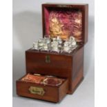 CAMPAIGN STYLE MAHOGANY MEDICINE BOX, 19th century, the fitted interior with ten original glass