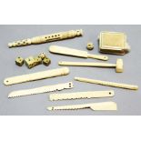 COLLECTION OF CARVED BONE ITEMS, to include a miniature cricket bat, hammer, dice, pin cushion and