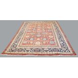 MAHAL CARPET West Iran, c. 1930, the soft madder field with an allover design of stylised