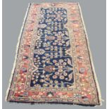 MUGHAL DESIGN RUNNER the indigo field with a one way design of semi naturalistic plants enclosed