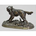 19TH CENTURY SCHOOL, Retriever standing above a hare cowering beneath leaves, on an oval base,