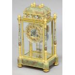 FRENCH BRASS AND CHAMPLEVE MANTEL CLOCK, 20th century, the dial with gothic arabic numbers on a