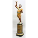 VENETIAN PLASTER BLACKAMOOR, mid 19th century, modelled standing wearing a gilt outfit and holding