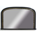 VICTORAIN EBONISED AND GILT OVERMANTEL MIRROR, the arching plate inside a moulded frame with gilt