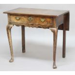 OAK SIDE TABLE, mid 18th century, the top with a rear drop leaf above a single drawers, shaped