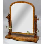 VICTORIAN SATINWOOD TOILET MIRROR, the arched plate on tulip carved supports with adjustable brass