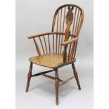YEW AND ELM WINDSOR CHAIR, with pierced and 'target' splat, turned arm supports, sold seat and