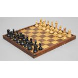 STAUNTON CHESSMEN, by Jaques & Son, London, competition size in boxwood and ebony, weighted, with