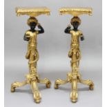 PAIR OF GILTWOOD AND PAINTED BLACKAMOOR STANDS, 19th century, possibly Venetian, the figures holding