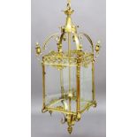 GEORGIAN STYLE BRASS CEILING LANTERN, the pierced frame with foliate bud finials, height 115cm,