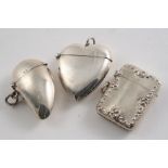 A LATE VICTORIAN PLAIN SILVER VESTA CASE in the form of a mussel shell, maker's mark worn,