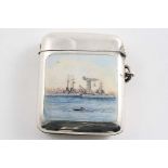 AN EDWARDIAN SILVER VESTA CASE enamelled on the front with a Royal Naval dockyard and a submarine in