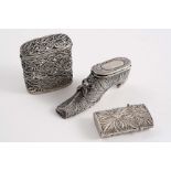 THREE LATE 19TH CENTURY SILVER FILIGREE-WORK VESTA CASES all unmarked; the shoe 2.75" (7 cms)