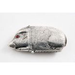 A VICTORIAN SILVER VESTA CASE in the form of a boar with red glass eyes, by Stokes & Ireland,