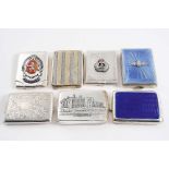 BOOK MATCH HOLDERS:- One silver one with scroll engraving, one silver with gold striping, three