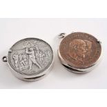 AN EDWARDIAN SILVER CIRCULAR VESTA CASE with a golfer, about to tee-off, on the front maker's