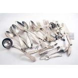 AN ASSORTMENT OF FOREIGN FLATWARE TO INCLUDE:- Twelve table spoons, two small ladles, a pair of