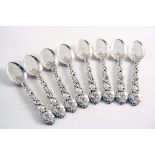 A SET OF EIGHT LATE VICTORIAN PIERCED VINE PATTERN ICE CREAM SPOONS by Messrs. Slater, Slater &