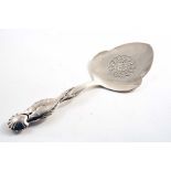 A MID 20TH CENTURY DANISH DOLPHIN PATTERN FISH SLICE with a shell terminal and engraved & pierced