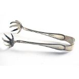 A PAIR OF LATE 19TH CENTURY INDIAN COLONIAL ICE TONGS Bead pattern with large claw grips, by