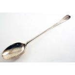 A QUEEN ANNE HANOVERIAN PATTERN BASTING OR SERVING SPOON with a plain moulded rattail & the initials