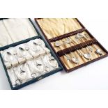 AN EDWARDIAN CASED SET OF SIX COFFEE SPOONS with heart-shaped bowls and wirework terminals with ball